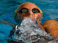PIM PortforlioSports 022  A St. Pete High swimmer competes in the backstroke event during a swim meet. - PhotosinMotion.net. : St. Pete High swimmer photos, pictures of a swimmer doing the backstroke, SPORTS, high SCHOOL, SWIMMING pictures, PhotosinMotion.net